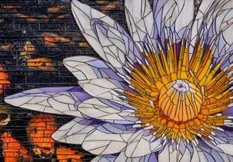 "Water Lily" mosaic made from stained glass, murano millefiori, river rock and original photography under the glass, 21" x 35" x 2" by artist Cherie Bosela. See her incredible portfolio at www.ArtsyShark.com