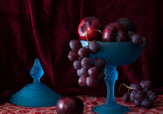 "Blue Vase with Plums and Grapes" Photography, Various Sizes by artist Yelena Strokin. See her portfolio by visiting www.ArtsyShark.com