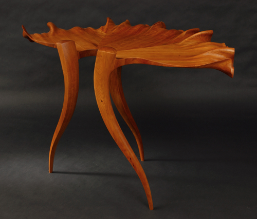 “Sun Valley Leaf Hall Table” Cherry, 30” x 50” x 27” by artist Mark Levin. See his portfolio by visiting www.ArtsyShark.com