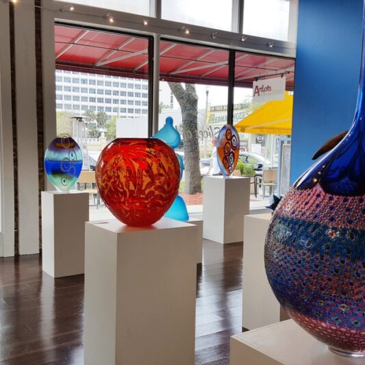 Display of glass vessels at a gallery