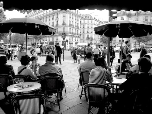 black and white photo of an old Paris cafe