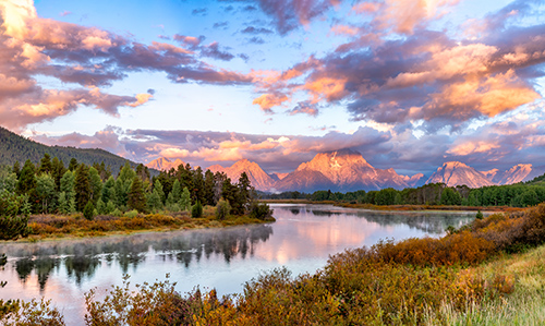 photograph of a sunrise at Oxbow Bend