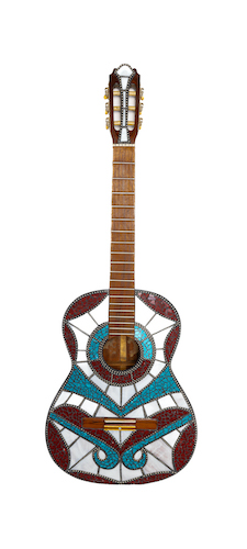 reclaimed guitar covered with mosaic design