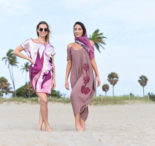 two women modeling hand printed bespoke art clothing