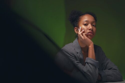 A photo of a pensive woman