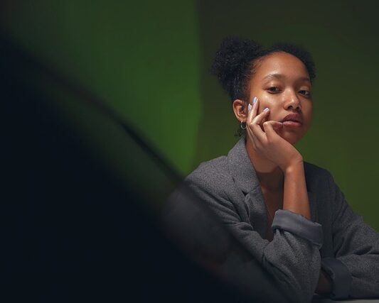 A photo of a pensive woman