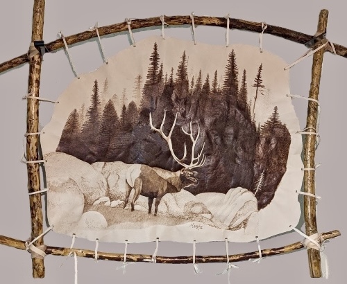 pyrography image of an elk on leather