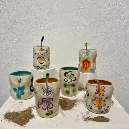 collection of ceramic juice glasses