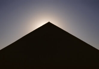 minimalist photograph of a barn