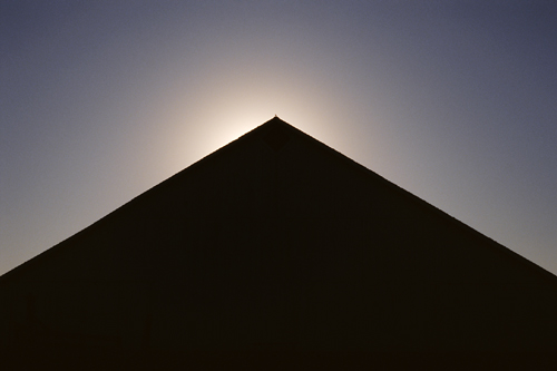 minimalist photograph of a barn