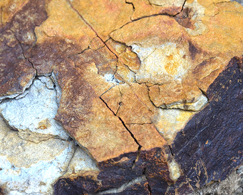 photograph of cracked rocks as an abstract image