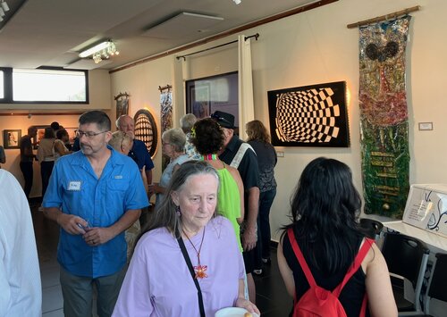 attendees at an art gallery show